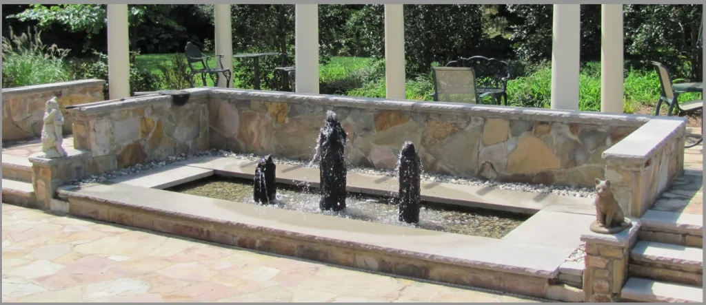 Triple basalt fountain in backyard